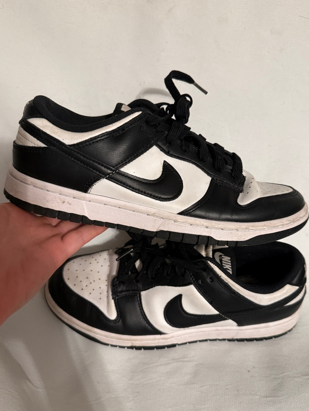 Nike Dunk Low Retro White Black sneakers universally known as the "Panda" Dunks